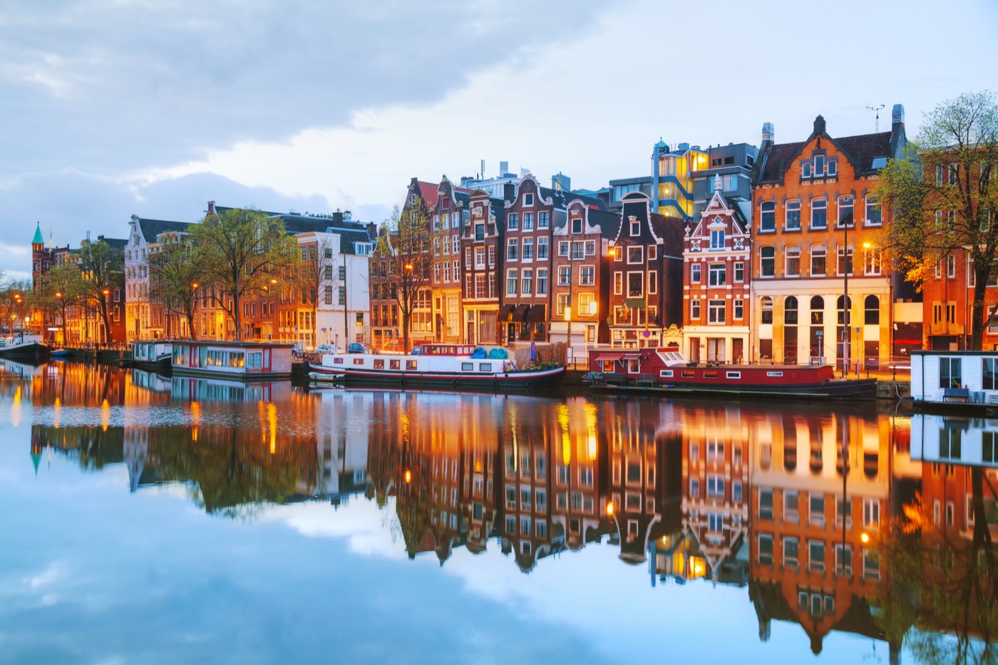 Amsterdam's canal ring at dusk, departure port of the Inaugural Voyage