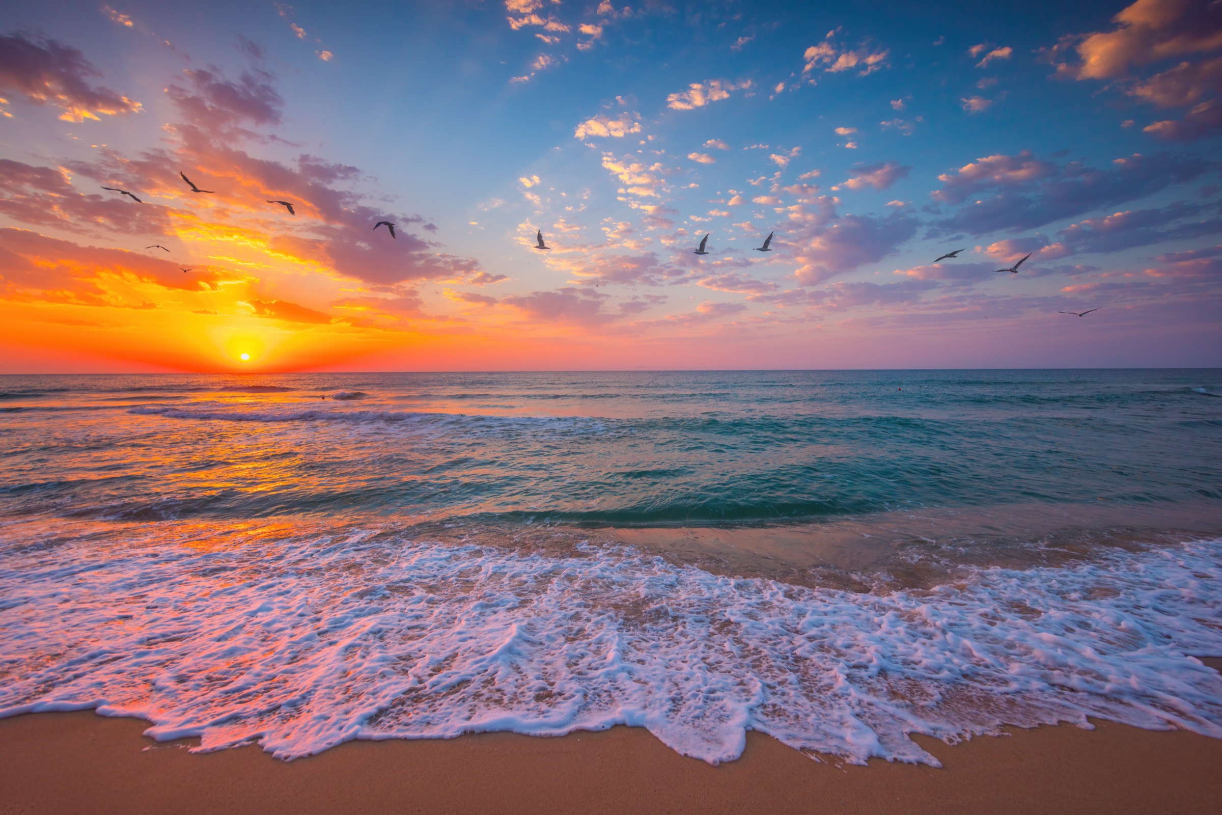 Sunset over the Caribbean shoreline