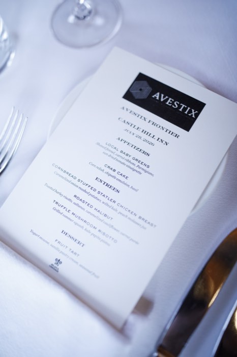 The menu for the evening: local baby greens, crab cake, cornmeal-stuffed statler chicken.
