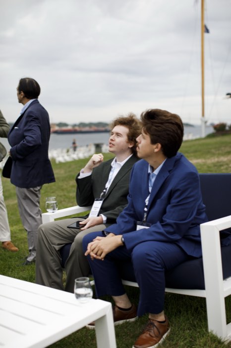 Guests settling into the lawn furniture.
