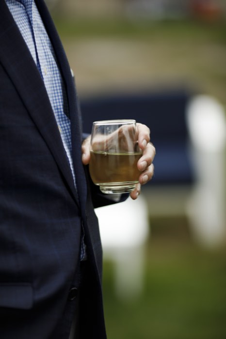 A drink in hand, waiting for the evening to begin.