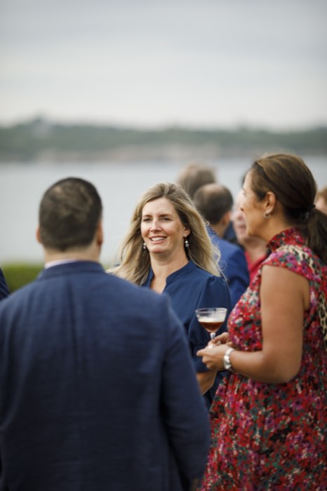 Three guests in conversation.