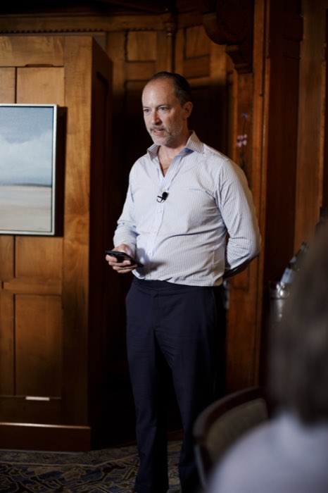 R. Adam Smith, welcoming the guests.