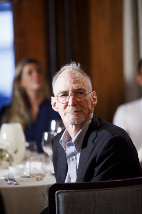 At the table during the remarks.