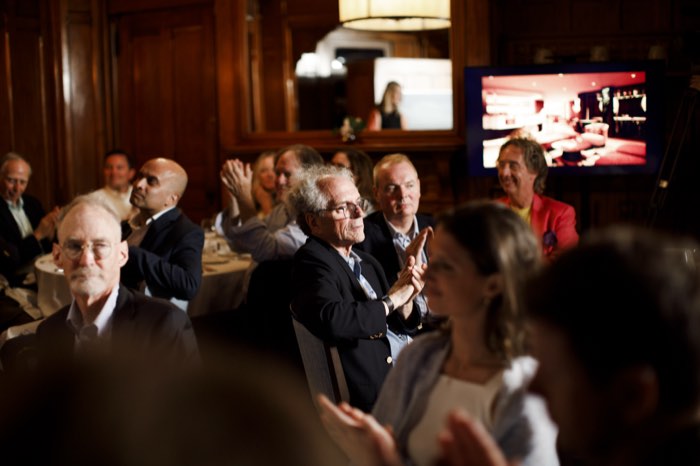 Applause from the tables.