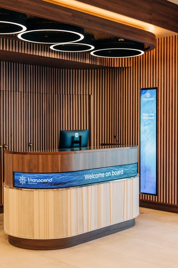 The reception desk aboard Transcend Connect